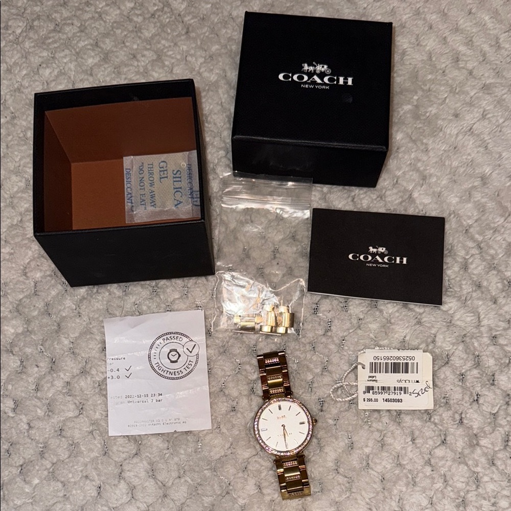 Coach Women’s Gold Diamond Watch